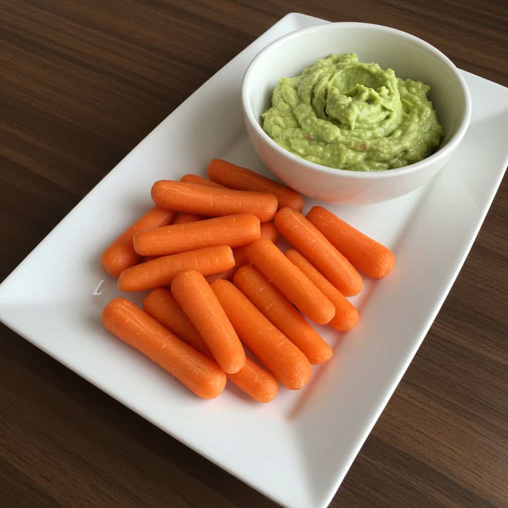 15. Baby Carrots with Guacamole